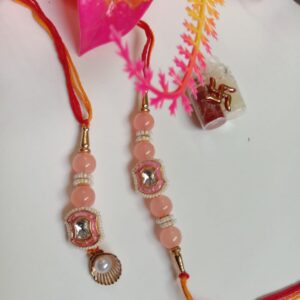 PREMIUM PAIR RAKHI WITH SET OF TWO RAKHIES.