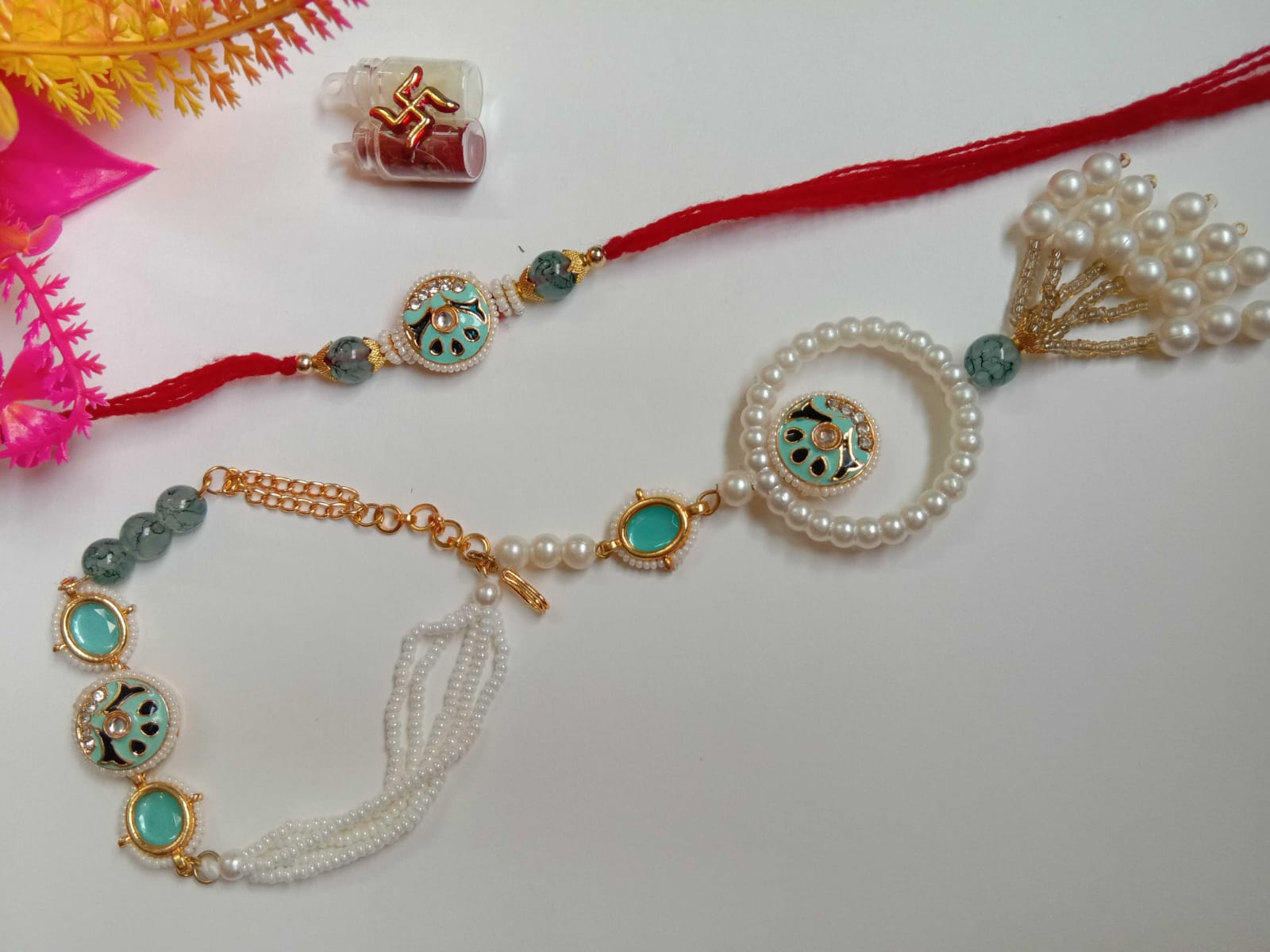 PREMIUM KUNDAN PAIR RAKHI WITH SET OF TWO RAKHIES.