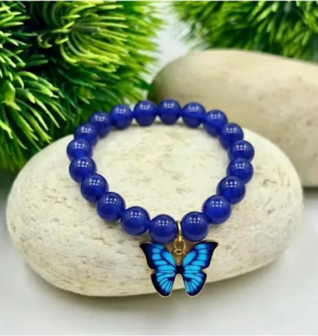 PREMIUM BUTTERFLY BRASLET WITH BLUE PEARLS.